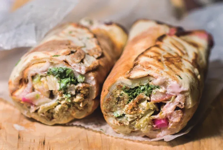 Charcoal-grilled Middle Eastern chicken wrap in Madrid