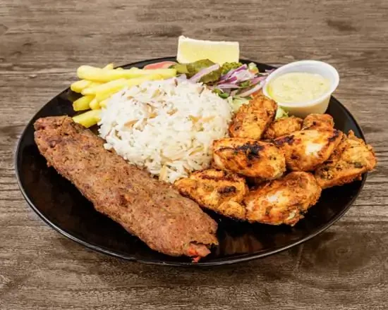 Mixed barbecue chicken and kefta plate at The Matbah near Puerta del Sol